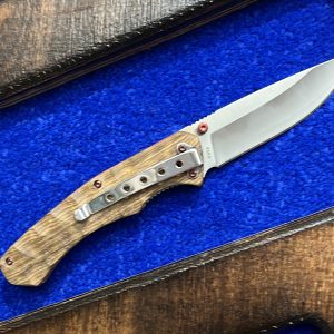 Boker Magnum red pupil brown knife
